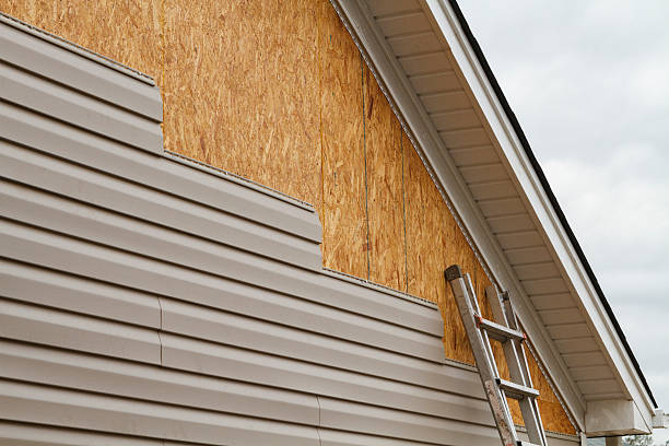 Professional Siding Replacement technician working in Avella, PA
